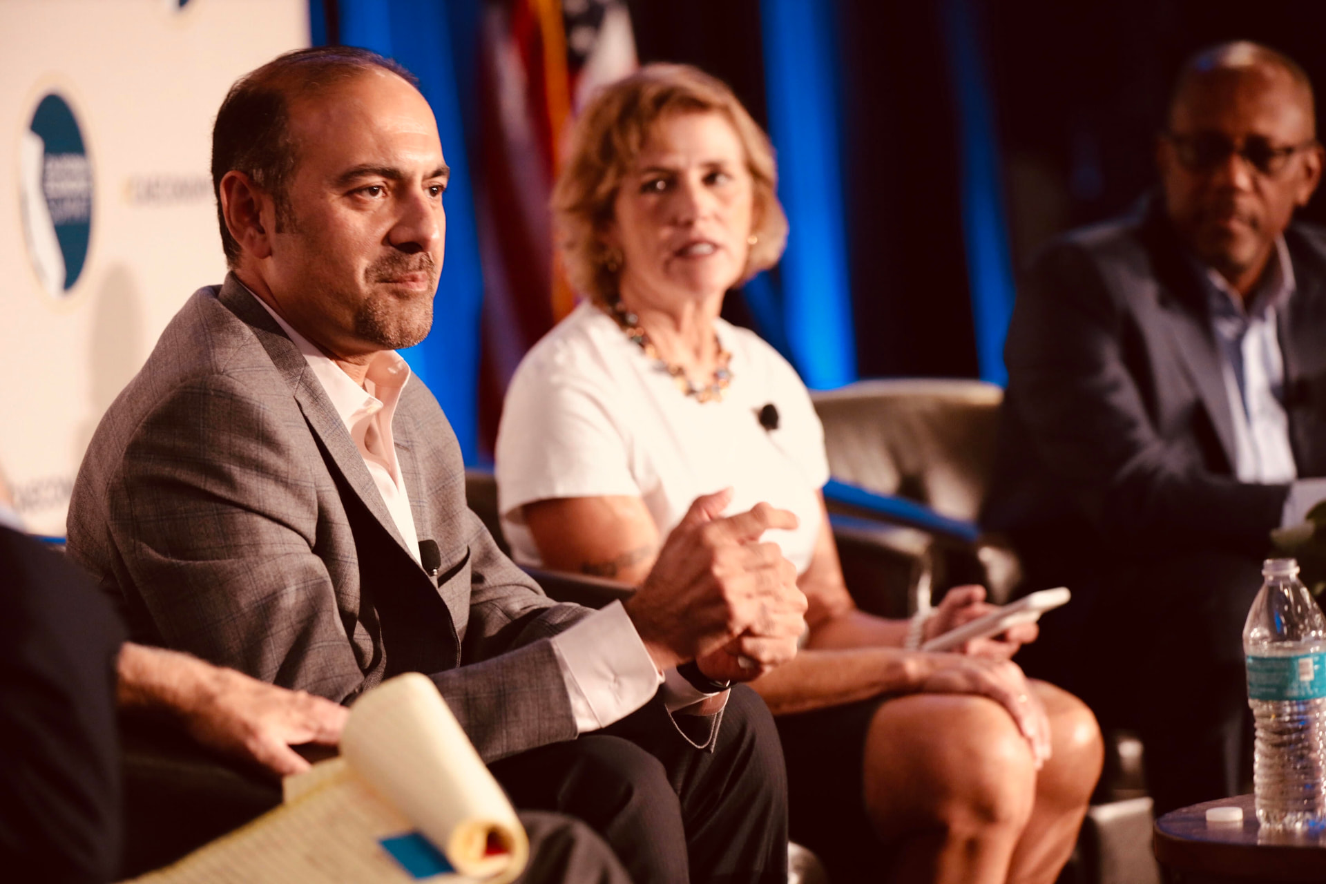 Dilawar Syed speaking on a panel at a California economic summit
