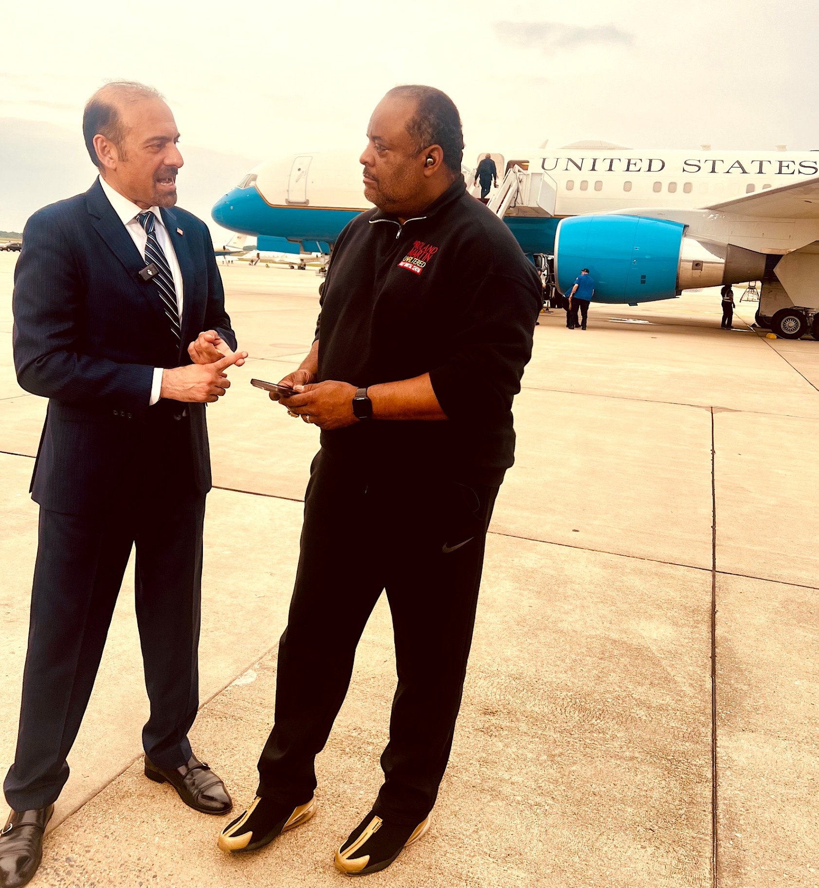 Official diplomatic meeting with Air Force One in background